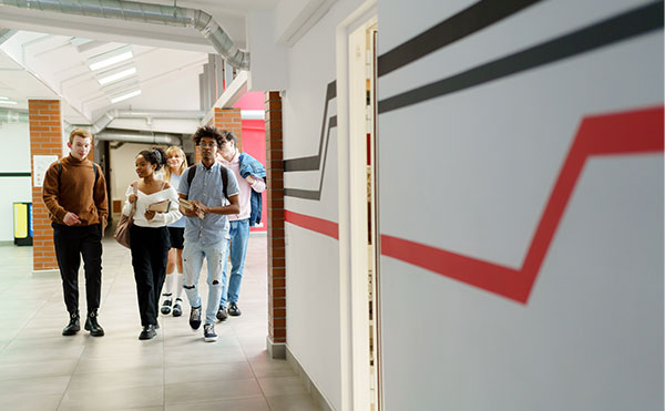 students-walking-inside-school-building